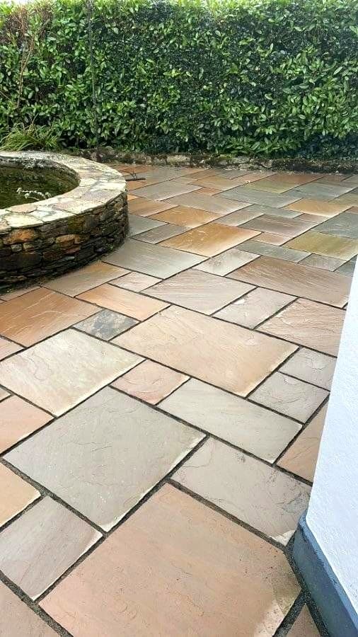 Clean sandstone patio in Devon after professional pressure washing