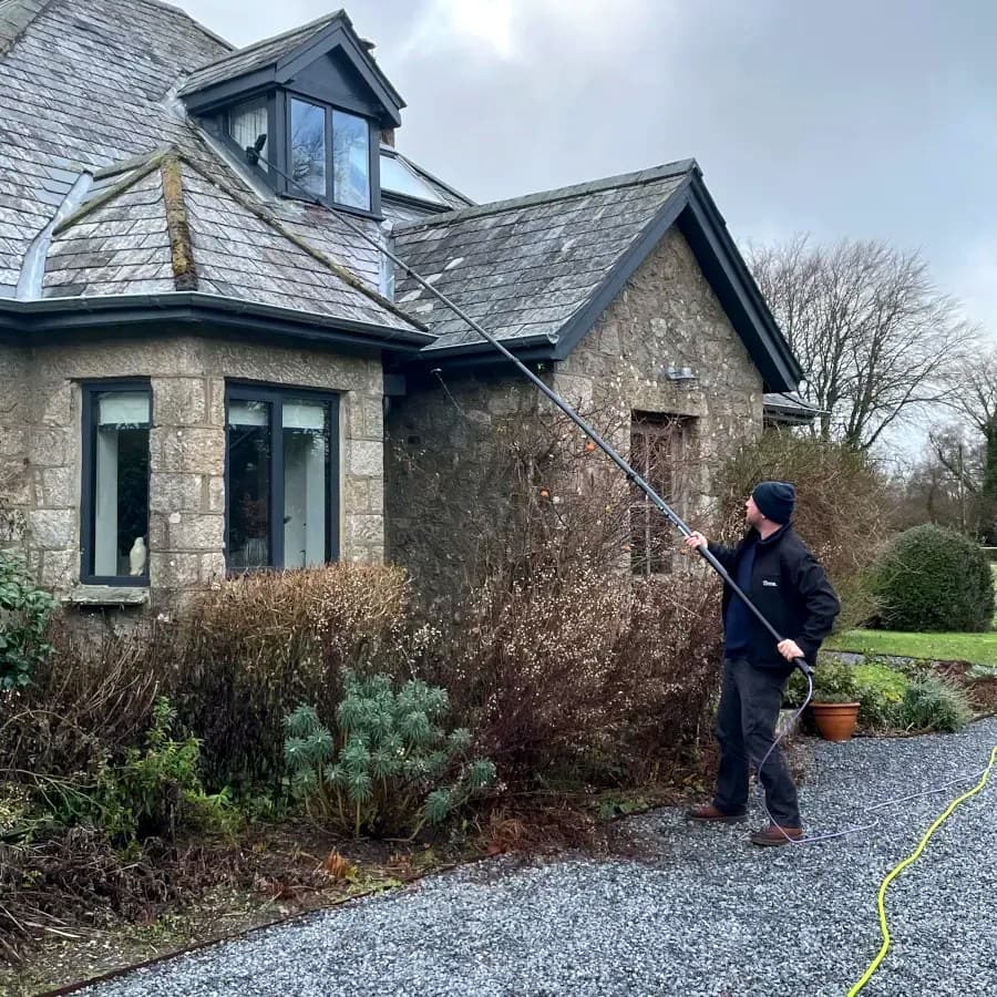 Softwashing the render and stonework of a traditional Devon cottage